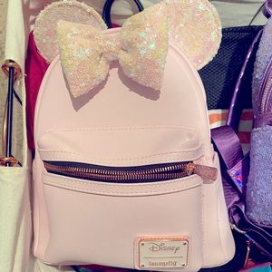 Pink Mickey ear loungefly backpack.